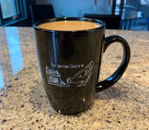 THE WRITING CHEEKIN mug of coffee
